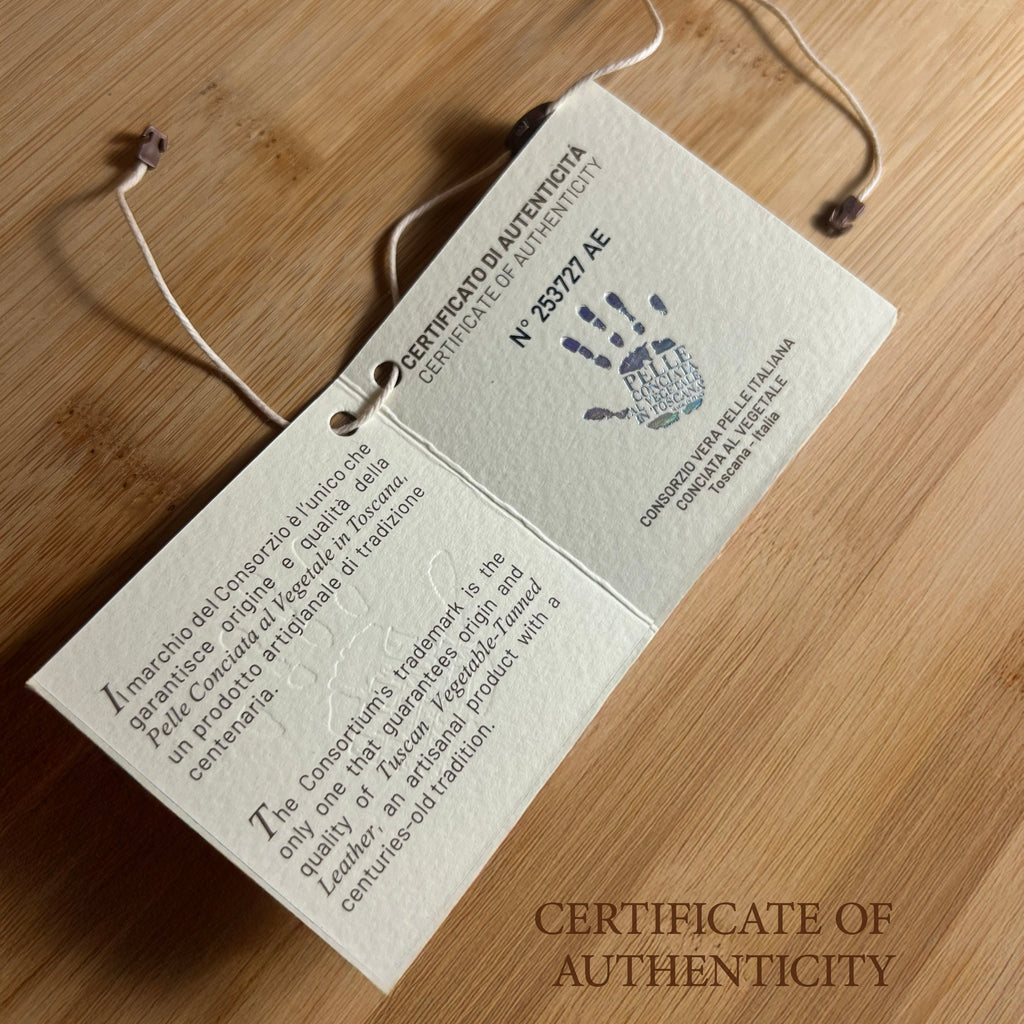 Certificate of Authenticity with handprint on a wooden surface