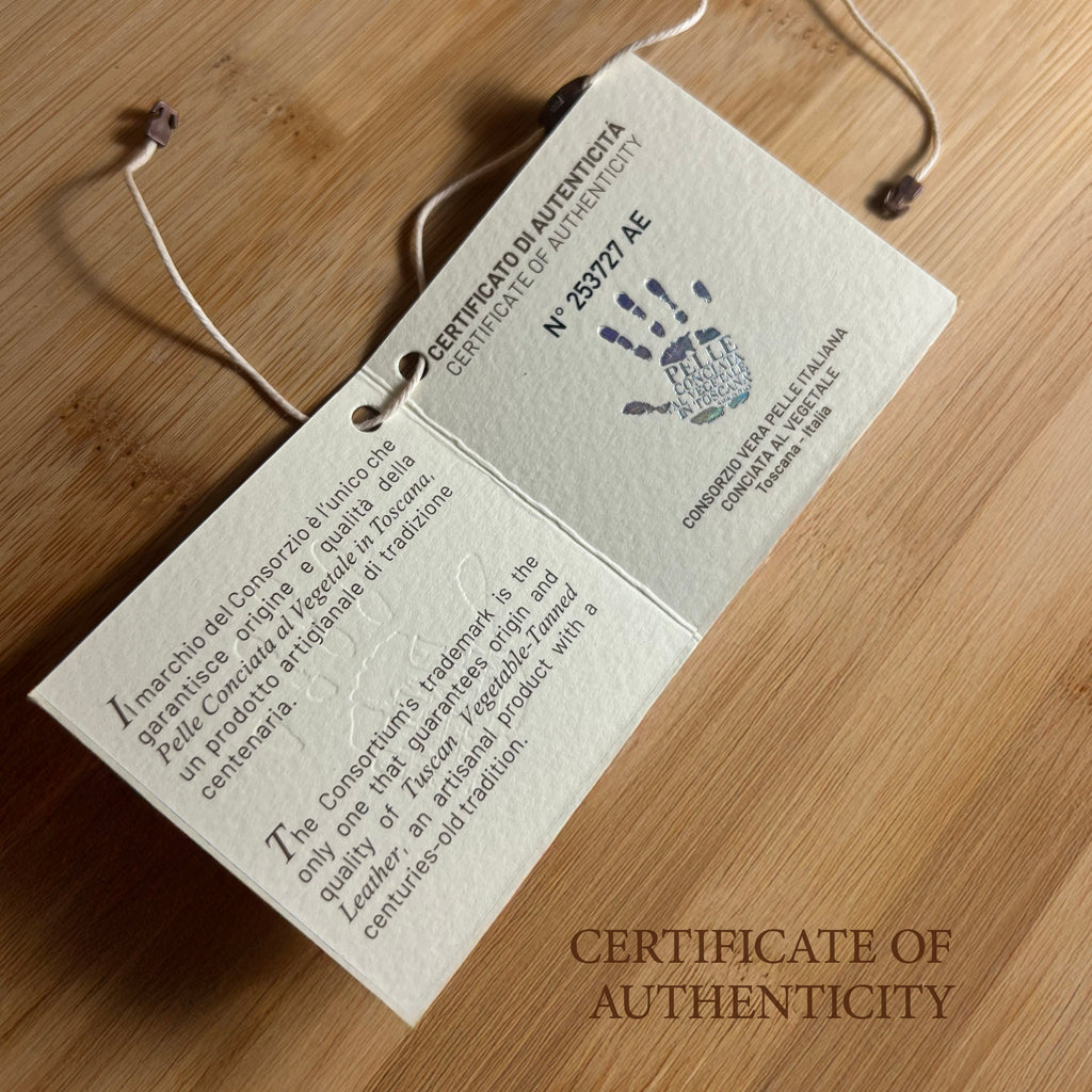 Certificate of Authenticity with handprint on a wooden surface